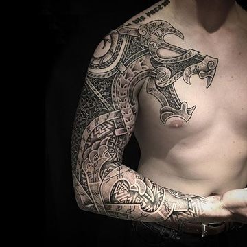 tatuajes de dragones en el brazo para hombres.jpeg